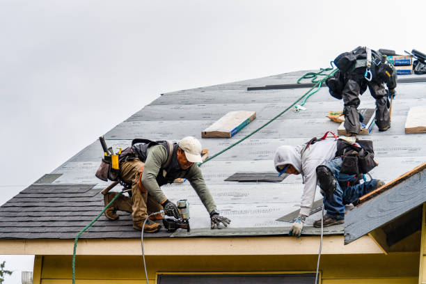 Professional Gutter Installation technician working in Cambridge, IA